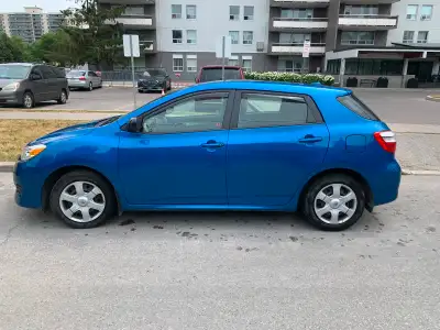 No smoking woman driving, Michelin tires, winter tires on the rims.