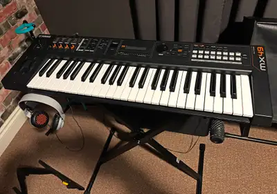 Yamaha MX49 - 49 Full-size key synthesizer (128 polyphony) with custom case and deluxe Yorkville X-s...