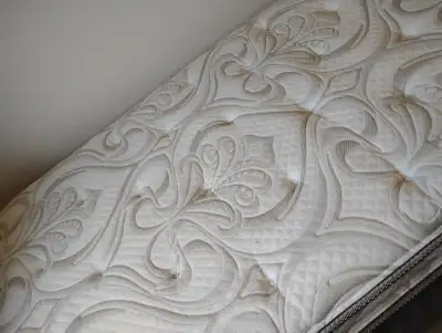 Twin beds with remotes to prop up, View more