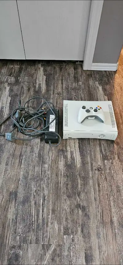 Please see photos 6 and 7 At first glance, it looks like a normal Xbox 360 However, the dashboard ha...