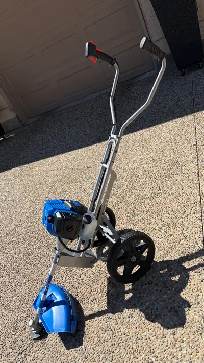 Power Fist (HYUNDAI) WALK BEHIND WEED TRIMMER. Has a couple Power Fist stickers on it so Princess Au...