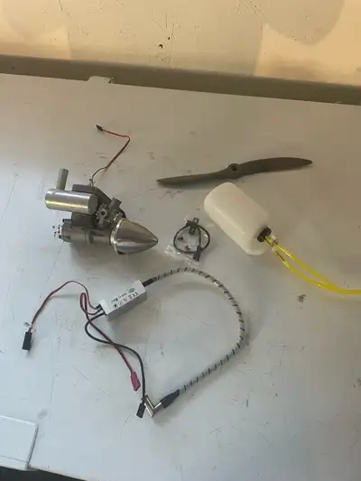 Brand new NGH 9cc gas engine for sale, never been run. Comes with an 11x7 gas propellor, fuel tank,...