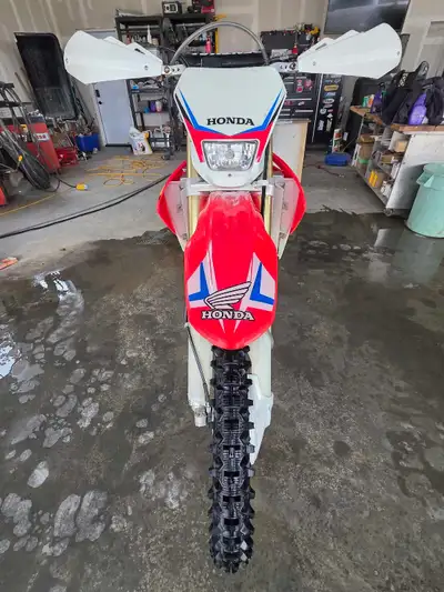 I am selling a used Honda CRF 450X 2014, known for its robust performance and reliability on trails;...