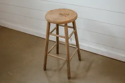 TWO SOLID PAINTED WOODEN STOOLS, View more
