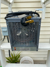 240V small portable shop heater. New, never been used.
