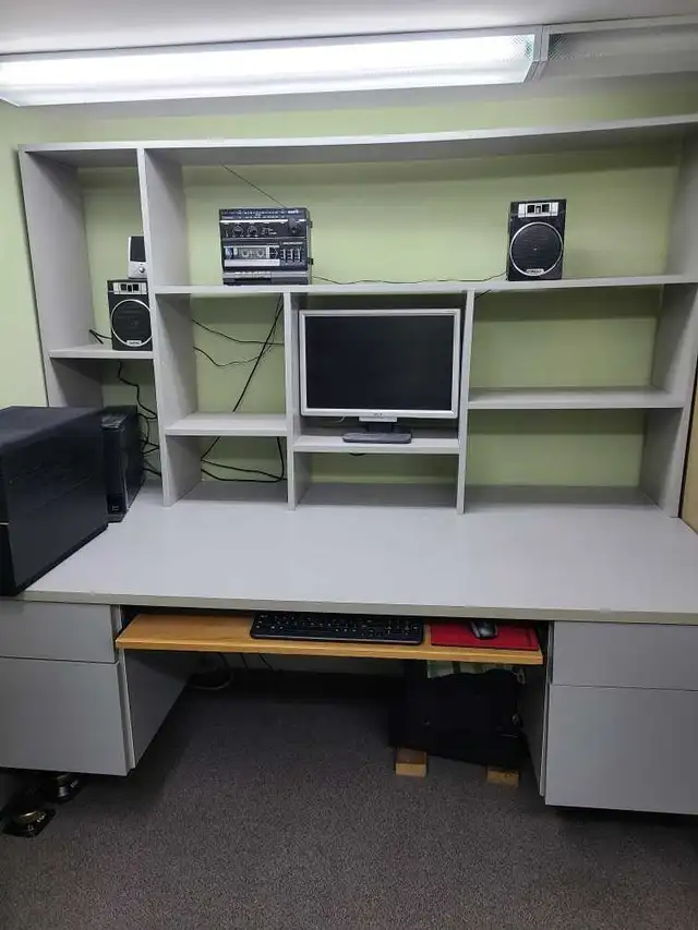 Large solid office desk with upper storage