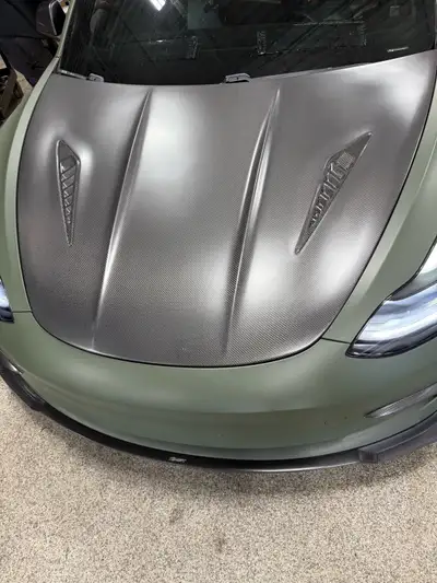 Enhance the look of your Tesla Model 3 (2017-2021) with this CMST carbon fiber hood! This aftermarke...