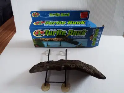 This is a Zoo Med floating aquarium dock. It was used for smaller turtles, Size is small measuring 5...