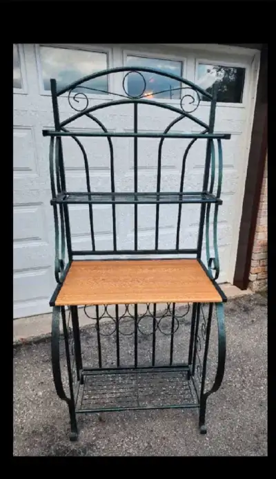 Antique bakers rack with wine bottle holders. Perfect for extra counter and storage space for kitche...