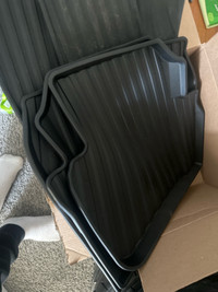 Rubber and cloth floor mats brand new! 