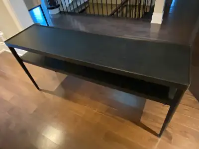 Dark brown wood console table. 15”W by 59”L by 28”H