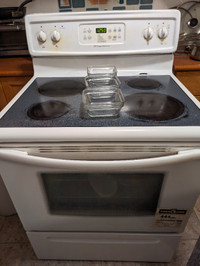 electric  range stove, clean , never use at the bottom oven