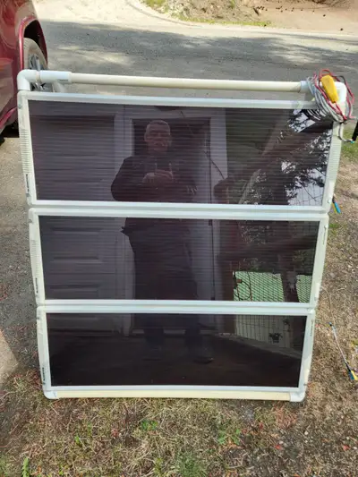 RV solar panel with battery controller. 40" x 40: with stand. Located at Loon Lake north of Cache Cr...