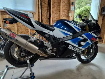 2003 Suzuki GSXR1000, 35,464km. Original owner. This bike can do everything, from track days to tour...