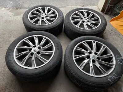 I'm selling a set of four 215/55R17 all-season tires mounted on original Toyota OEM alloy wheels. Th...