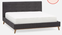 Tufted upholstered king-size bed