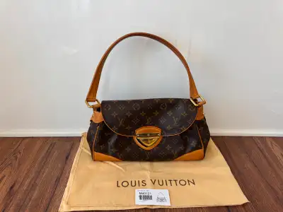 Louis Vuitton Beverly Handbag. Excellent Condition. Check Out Our Other Ads.