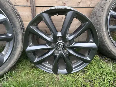 I am selling 4 original wheels from a Mazda 3 GT Sport with pressure sensors. One rims is very damag...
