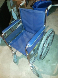 $75.folding wheel chair. brakes. does not have folding footrest