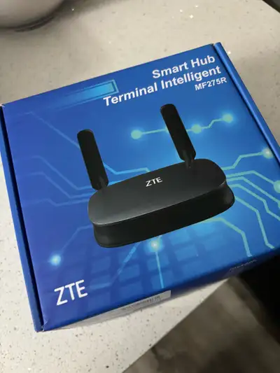 Networking router/ hotspot 4G Older model MF275R, but works well. Comes with box, power cable, ether...