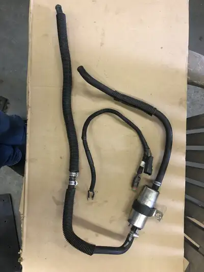 Off Skidoo 1000 SDI Summit Highmark X The stock low pressure fuel pump is located under the engine a...