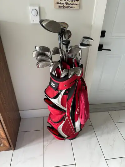 Full set of  golf clubs with extra clubs., View more
