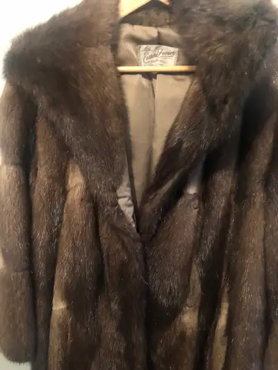 Eastern Furriers woman’s fur coat, View more