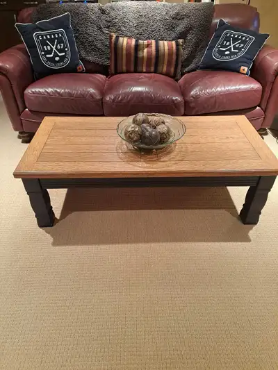 Newly refinished solid wood coffee and end table Solid wood legs and trim, oak veneer center Coffee...