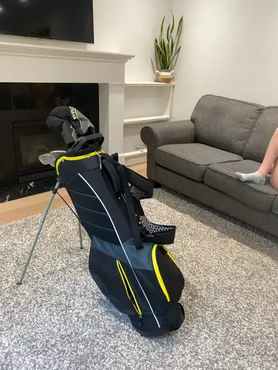 A set of Wilson profile, golf clubs,for kids, used only five times left handed, In very good conditi...