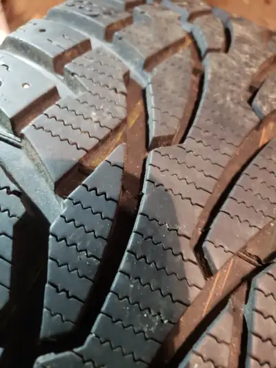 Set of four 225 65 17 Uniroyal TigerPaw snow tires on steel rims. Bolt pattern: 5x114.3 with large c...