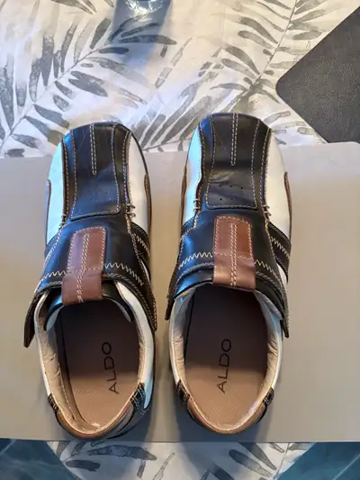 These are a pair of gently worn Aldo shoes size 11 Cash pick up only
