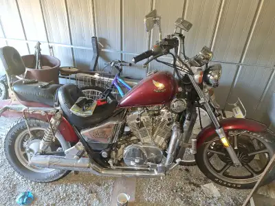 1986 honda shadow 750cc for sale, asking 2750OBO only 30,000kms on it, runs and drives, needs tires,...