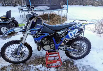 2002 Yz 250 with stand. Comes with the original seat, plus custom seat (installed), custom exhaust a...