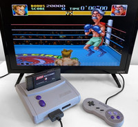 Super Nintendo SNES and games cartridge
