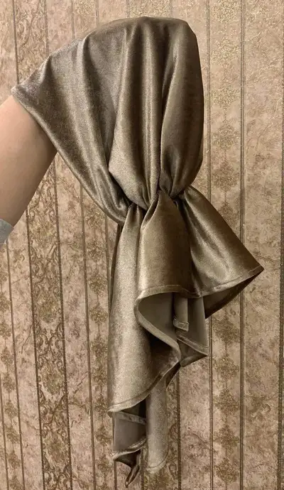 Accessorize your fit with this satin-like turban, perfect for adding a touch of elegance or flair to...