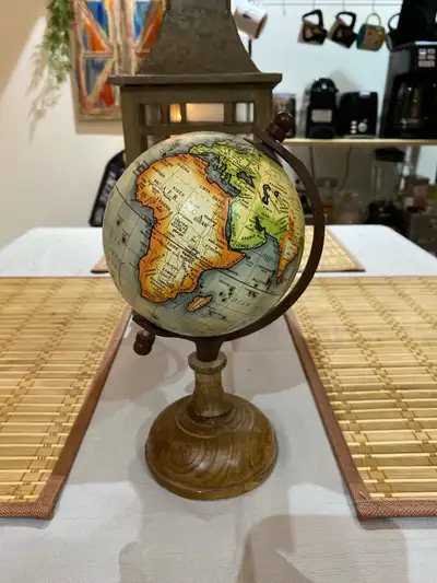 Perfect for adding a touch of vintage-inspired decor to your desk, bookshelf, or classroom, this glo...