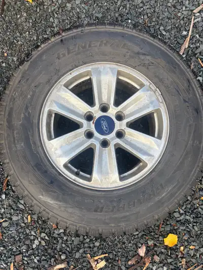 LT265/70R17 Studded General Grabber Arctic tires on factory Ford alloy rims. Tires are around 12-32n...
