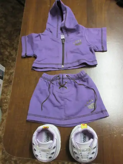 Accessories / Outfits: *Purple sweater, skirt and Sketcher shoes. Set $10 *Roller skates (adjustable...