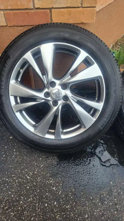 Four 235/55R20 Michelin Premier LTX (all season) tires, minimum 70% tread remaining, on OEM Infiniti...