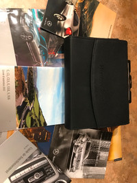 Mercedes leather pouch and owner’s manual for C-class, $20.