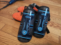 Youth soccer shoes with shin guard