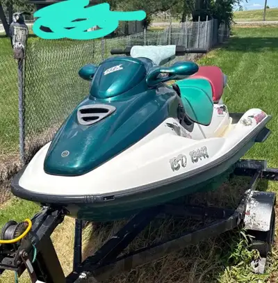 Runs, floats, fast, has oil and battery shutoff switch, takes gas smokes a bit til warm, comes with...
