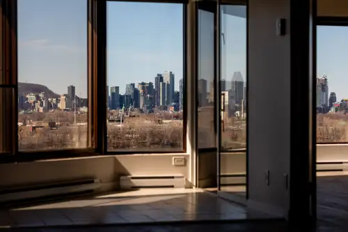 Bright 1 bedroom + den condo with stunning views + indoor garage space with private EV charger | Le...