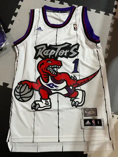 Brand new with tag Get your hands on this vintage Adidas Tracy McGrady Toronto Raptors jersey! It's...