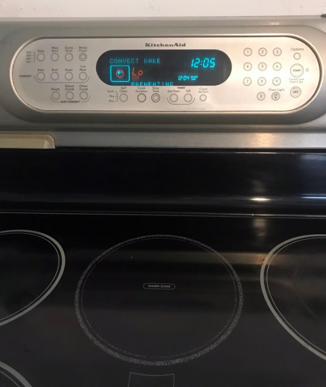 Kitchen Aid self clean n convection glass top stove, can deliver