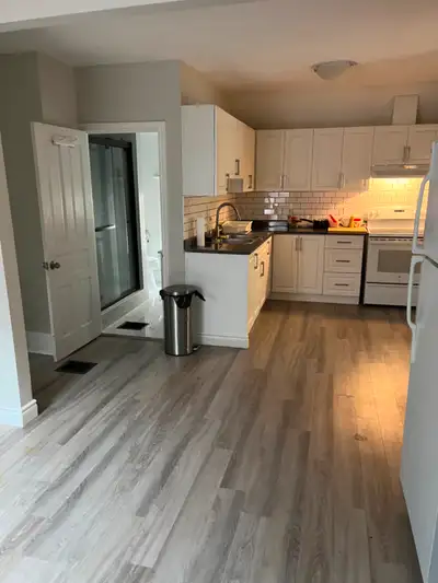 3 Bedroom plus den, in-suite laundry, central air, parking