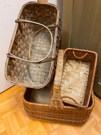 Three rectangular wicker hand baskets