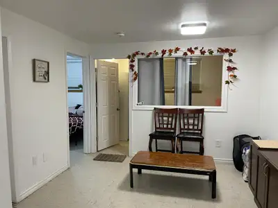 2 Bedroom legal basement apartment bright with big windows and separate laundry is available for ren...