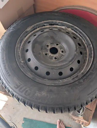 4 Bridgestone winter tires. On Rims. Good condition. Model: Blizzak WS90 Size: 225/65R17. Unbeatable...