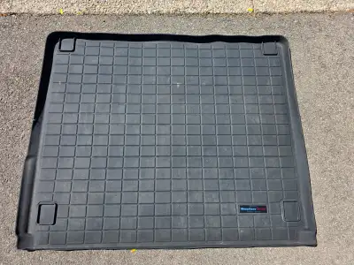 For sale is a used black WeatherTech cargo / trunk liner coming from a 2014 Volkswagen Touareg. Migh...